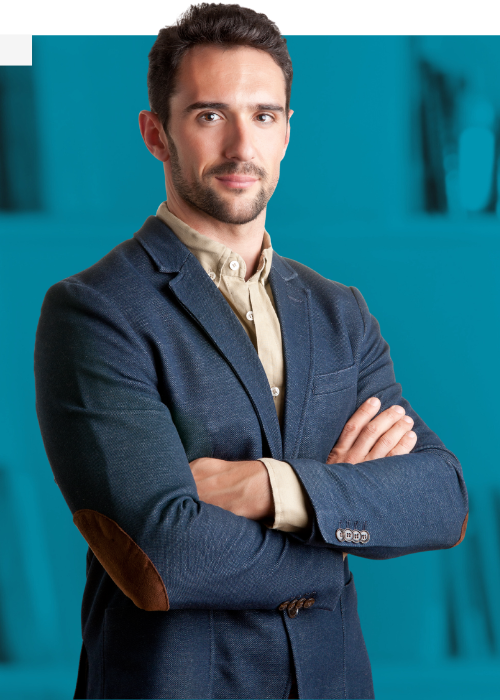 Businessman in a navy blazer with his arms folded