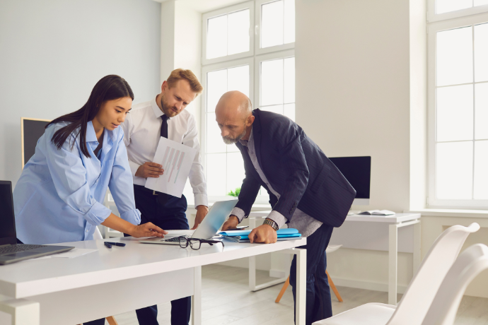 Team discussing plans in a bright office